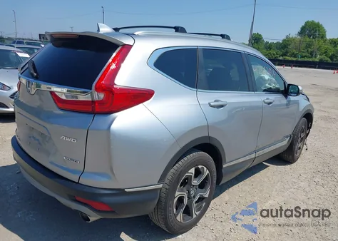2017 Honda Cr-V Touring z USA, uszkodzony, nr VIN 5J6RW2H93HL034300